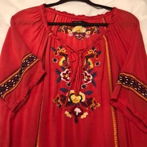 Gently used tunic top with detailed embroidery